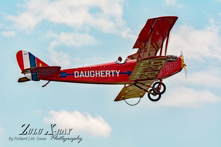Paul Dougherty at The Controls of The Curtiss Jenny