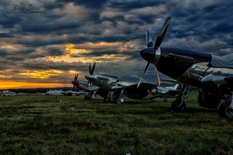 Andrew McKenna's slick P-51D along side "Mad Max" & "Quick Silver"