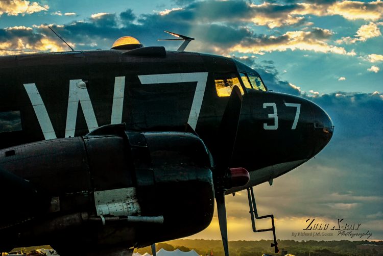 The sun rays come through C-47 "Whiskey 7" 's flight deck