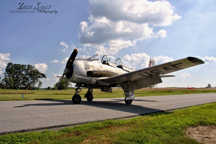 A T-28A Trojan Sits On The Taxiway - Photo by Richard Souza, Zulu X-Ray Photography