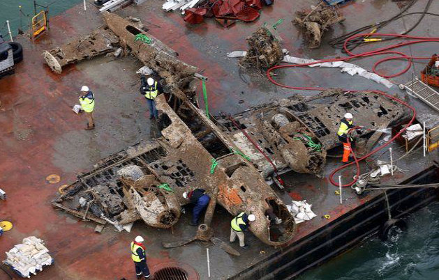 Dornier 17 on barge after being lifted from the bottom of the sea